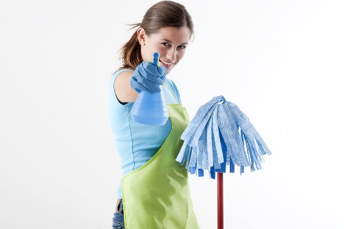 After builders cleaning in Islington removing dust from a renovated property