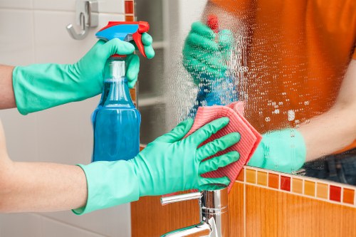 Cleaner assessing a work area for hazards before starting cleaning tasks