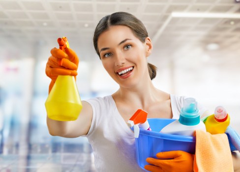 Cleaner preparing equipment for a booked service